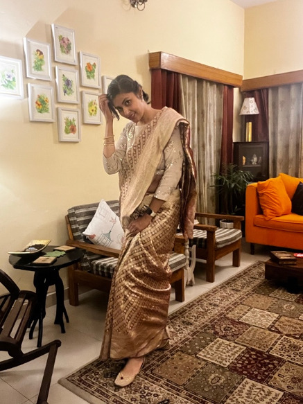 A woman in a sari.