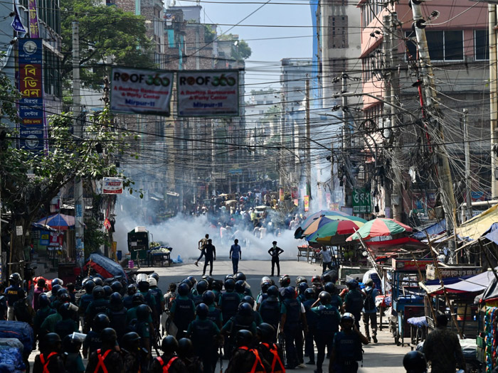 Bangladeshi garment workers took to the streets after rejecting an inadequate pay offer from the government.